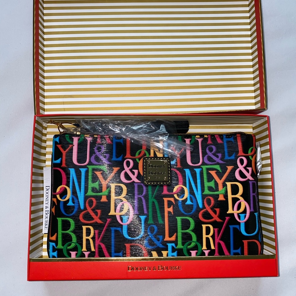 Dooney and Bourke brand new in box, clutch